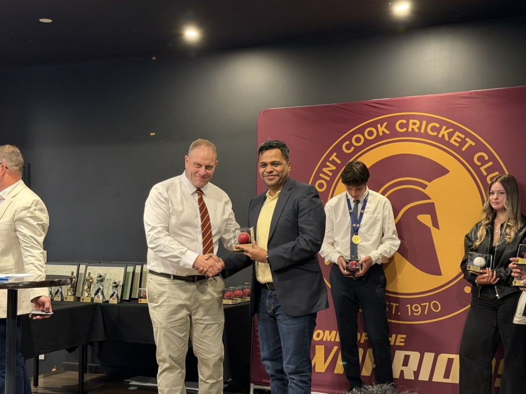 Receiving award at Point Cook Cricket Club presentation night